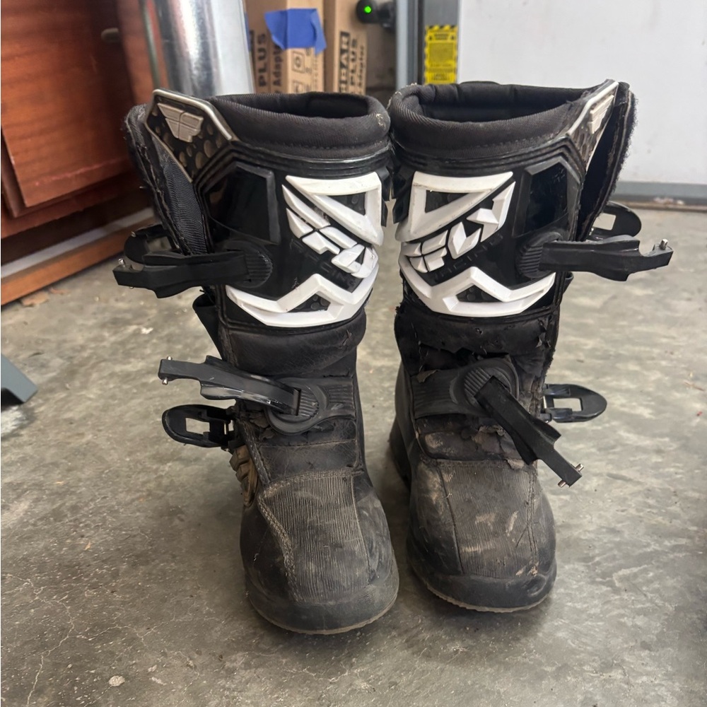 Black dirt bike riding shoes